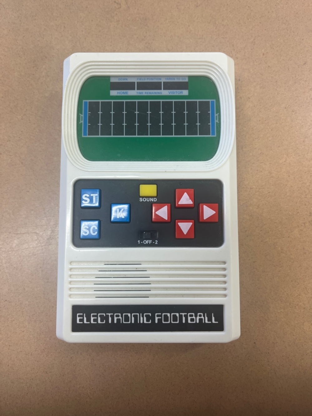 Mattel Electronic Football Handheld Game - White, Green, Red, Blue
